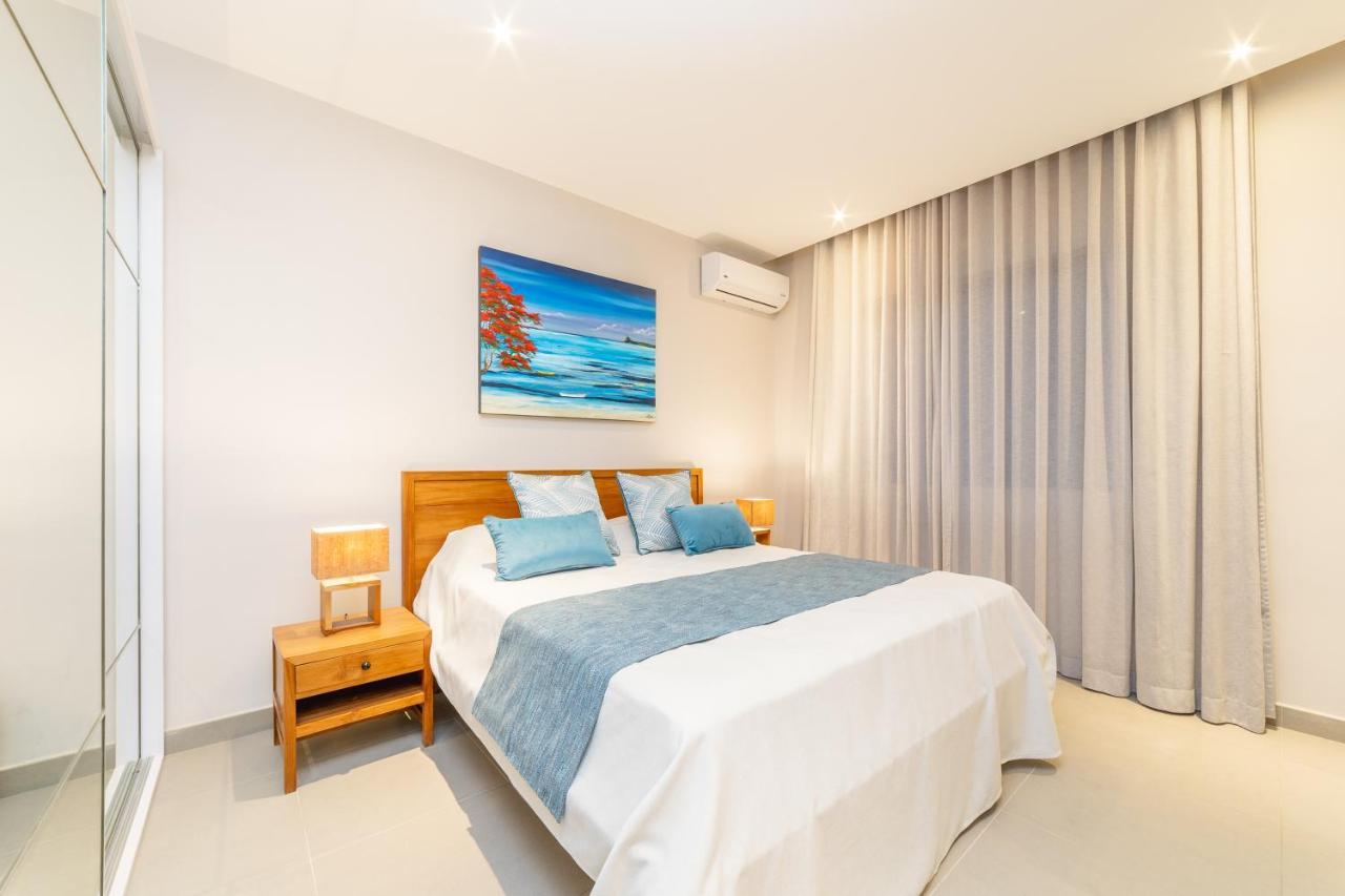 Penthouse 13 - One Bay Residence With Private Rooftop Terrace And Dip In Pool Pereybere Beach ภายนอก รูปภาพ